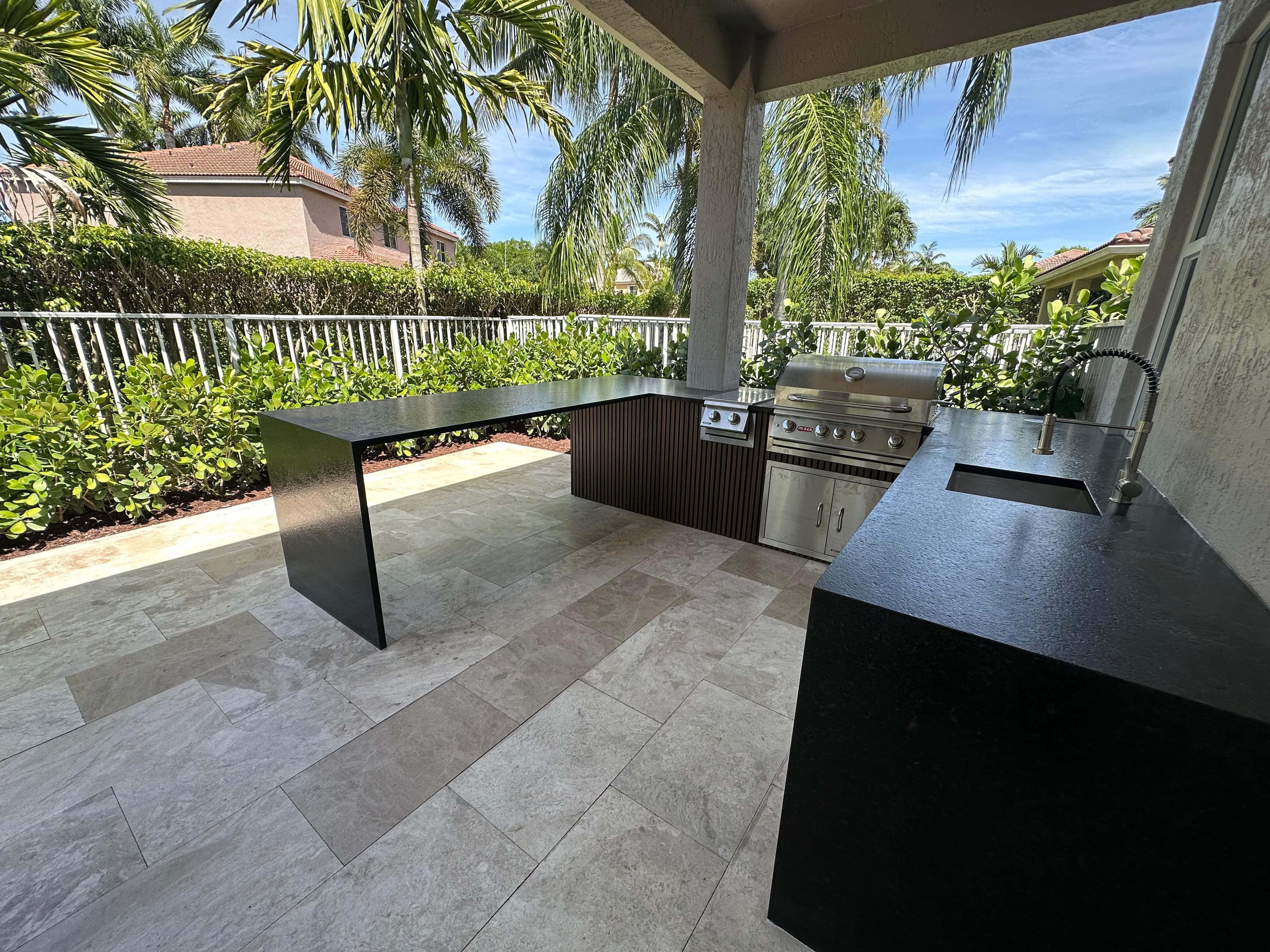 Complete outdoor kitchen and entertaining area with fire feature